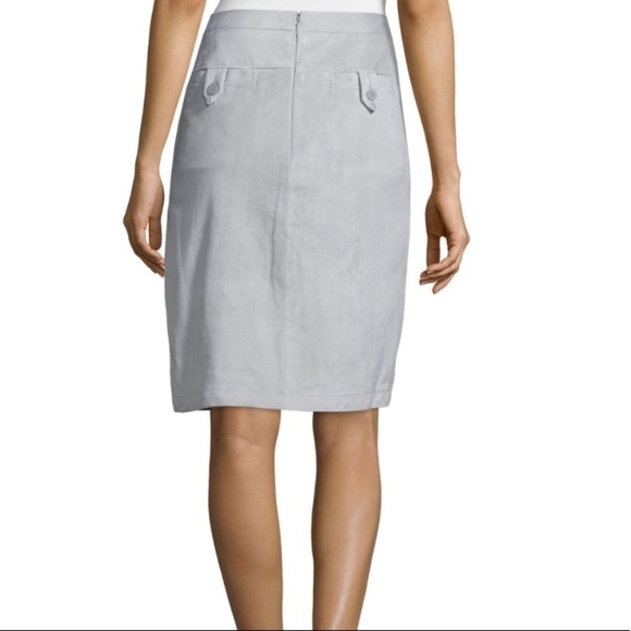 Genuine Lamb Suede Wrap‎ Skirt

HALSTON HERITAGE - Picture 2 of 8